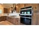 Well-equipped kitchen featuring updated appliances and custom cabinetry at 4299 Fiore Bella Blvd, Las Vegas, NV 89135