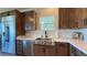 Updated kitchen featuring stainless steel appliances and granite countertops at 4299 Fiore Bella Blvd, Las Vegas, NV 89135
