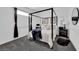 Cozy bedroom with a four-poster bed, plush bedding, and dark accents at 4428 Mural Glen Ct, North Las Vegas, NV 89084