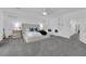Spacious bedroom featuring king bed, ceiling fan, and carpet flooring at 4428 Mural Glen Ct, North Las Vegas, NV 89084