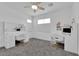 Bedroom featuring 2 workstation, ceiling fan, with carpet flooring at 4428 Mural Glen Ct, North Las Vegas, NV 89084