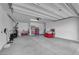Spacious two car garage with high ceilings and ample room for storage at 4428 Mural Glen Ct, North Las Vegas, NV 89084