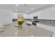 Spacious kitchen featuring stainless steel appliances, an island, modern cabinets, and recessed lighting at 4428 Mural Glen Ct, North Las Vegas, NV 89084