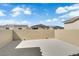 Private rooftop patio with stucco wall offering an outdoor living space at 4428 Mural Glen Ct, North Las Vegas, NV 89084