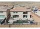 Expansive backyard with pool, patio, balcony, and outdoor seating, perfect for outdoor relaxation and entertainment at 4576 Amazing View St, Las Vegas, NV 89129
