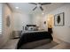 Comfortable bedroom with elegant wallpaper, and an ensuite bathroom at 4576 Amazing View St, Las Vegas, NV 89129