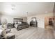 Elegant bedroom features a large upholstered bed, mirrored nightstands and furniture, and tile floors at 4576 Amazing View St, Las Vegas, NV 89129