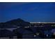 This nighttime shot captures the city lights and mountain views at 4576 Amazing View St, Las Vegas, NV 89129