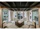 View of modern outdoor patio with fire pit and comfortable lounge seating at 4576 Amazing View St, Las Vegas, NV 89129