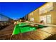 Inviting backyard pool and spa area with lounge chairs and a balcony, perfect for relaxation and entertaining at 4576 Amazing View St, Las Vegas, NV 89129