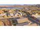 Aerial view showcasing a neighborhood, a home's roof, and a scenic mountain background at 52 Reverie Heights Ave, Henderson, NV 89011