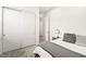 Bedroom featuring a comfortable bed, closet, and contemporary decor at 52 Reverie Heights Ave, Henderson, NV 89011