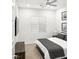Relaxing bedroom with neutral colors, plush bedding, and ample natural light from the window at 52 Reverie Heights Ave, Henderson, NV 89011