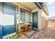 Comfortable front porch features two chairs with a small table in between at 52 Reverie Heights Ave, Henderson, NV 89011