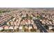 Aerial view of a residential community with a home pinpointed in red at 5573 La Perla Ct, Las Vegas, NV 89122