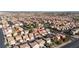Aerial view of a residential community with a home pinpointed in red at 5573 La Perla Ct, Las Vegas, NV 89122