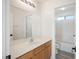 Bathroom featuring a light wood cabinet, quartz countertop, and tile flooring at 5573 La Perla Ct, Las Vegas, NV 89122