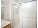 Bathroom with shower featuring sliding glass doors and bright lighting at 5573 La Perla Ct, Las Vegas, NV 89122