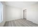 This bedroom has light gray flooring and a closet at 5573 La Perla Ct, Las Vegas, NV 89122