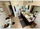 Bathroom featuring dual sinks, granite countertops and tile flooring at 5941 Galway Bay St, North Las Vegas, NV 89081