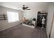 Bedroom featuring plush carpet, and bright natural light from a window at 5941 Galway Bay St, North Las Vegas, NV 89081