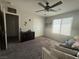 Bedroom with window, ceiling fan and neutral wall paint at 5941 Galway Bay St, North Las Vegas, NV 89081
