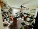 Cluttered spare bedroom with carpet and a window with blinds at 5941 Galway Bay St, North Las Vegas, NV 89081