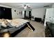 View of primary bedroom showcasing ceiling fan, curtains, and carpet at 5941 Galway Bay St, North Las Vegas, NV 89081