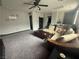 Open concept living room featuring a comfortable seating area and ample natural light at 5941 Galway Bay St, North Las Vegas, NV 89081