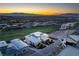 Luxury home with an elegant design, lush landscaping, and panoramic city views at 641 Majestic Rim Dr, Henderson, NV 89012