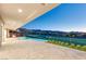 Step outside to a serene backyard with an inviting pool, patio, and golf course view at 641 Majestic Rim Dr, Henderson, NV 89012