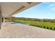 Expansive backyard featuring an infinity pool overlooking the golf course and mountain scenery at 641 Majestic Rim Dr, Henderson, NV 89012