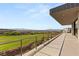 Balcony view of golf course, city and mountain views, with access to the home's modern interior at 641 Majestic Rim Dr, Henderson, NV 89012