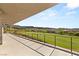 A spacious balcony overlooks a manicured golf course with views of desert landscape and mountains at 641 Majestic Rim Dr, Henderson, NV 89012