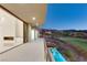Enjoy the expansive balcony and golf course views from this luxurious home at 641 Majestic Rim Dr, Henderson, NV 89012