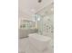 Sleek bathroom with a modern tub, glass shower, and stylish vanity at 641 Majestic Rim Dr, Henderson, NV 89012