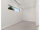 Bright room with carpet and window offering natural light and outside views at 641 Majestic Rim Dr, Henderson, NV 89012