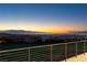 Enjoy stunning city and mountain views from the balcony of this exquisite home at 641 Majestic Rim Dr, Henderson, NV 89012