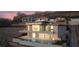 Modern two-story home boasts a pool, fire pit, balcony and mountain views at 641 Majestic Rim Dr, Henderson, NV 89012
