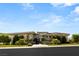 Beautiful modern home showcasing sleek lines, stone accents and well-manicured lawn at 641 Majestic Rim Dr, Henderson, NV 89012