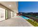 Gorgeous home with seamless indoor-outdoor living and a sparkling pool overlooking the golf course at 641 Majestic Rim Dr, Henderson, NV 89012