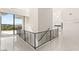 Bright foyer with marble floors and railing offers views of the outdoors at 641 Majestic Rim Dr, Henderson, NV 89012