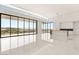 Bright great room with large windows offering panoramic views and modern finishes at 641 Majestic Rim Dr, Henderson, NV 89012