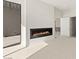 Cozy living room with a modern fireplace and plenty of natural light at 641 Majestic Rim Dr, Henderson, NV 89012