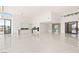 Bright, open-concept living space with modern kitchen, high ceilings, and large windows for natural light at 641 Majestic Rim Dr, Henderson, NV 89012