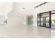 Bright, open living area featuring marble floors, a custom wine display, and high ceilings at 641 Majestic Rim Dr, Henderson, NV 89012