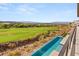 Infinity pool with sweeping views of the golf course, desert landscape and mountains at 641 Majestic Rim Dr, Henderson, NV 89012