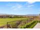 Expansive backyard view overlooking a lush golf course, desert landscape, and mountain views at 641 Majestic Rim Dr, Henderson, NV 89012