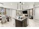 Spacious kitchen with granite countertops, stainless steel appliances, and open layout at 711 Florence Isle Ave, Henderson, NV 89015