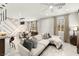 Open-concept living space with a dining area, modern decor, and lots of natural light at 711 Florence Isle Ave, Henderson, NV 89015